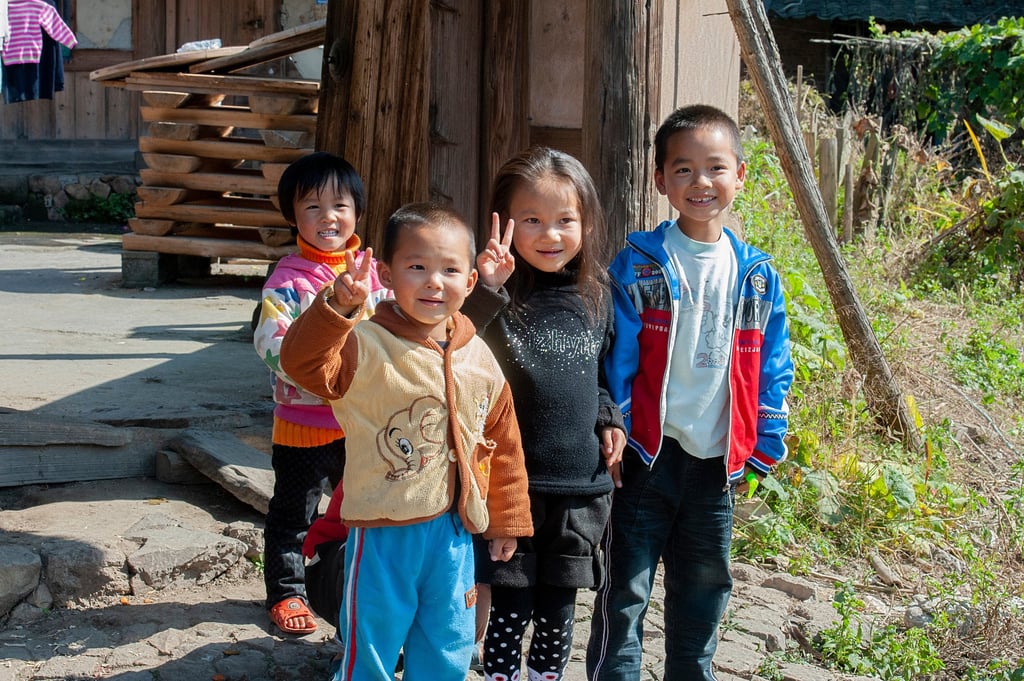 A group of children play in a rural village in China. The beating ritual was largely confined to the countryside. Photo: Shutterstock