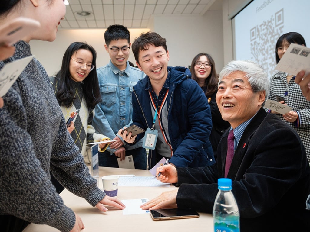 Professor Youmin Xi (seated), executive president of XJTLU, says educational innovation has been the university’s core focus since it was established 20 years ago.