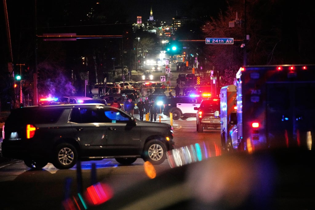 Law enforcement at the scene of the latest shooting. Photo: AP