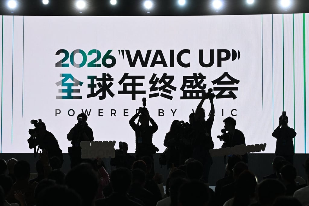 Photographers are seen snapping pictures of guests at a summit under the World Artificial Intelligence Conference, held at the Hong Kong Science Park on Friday. Photo: AFP