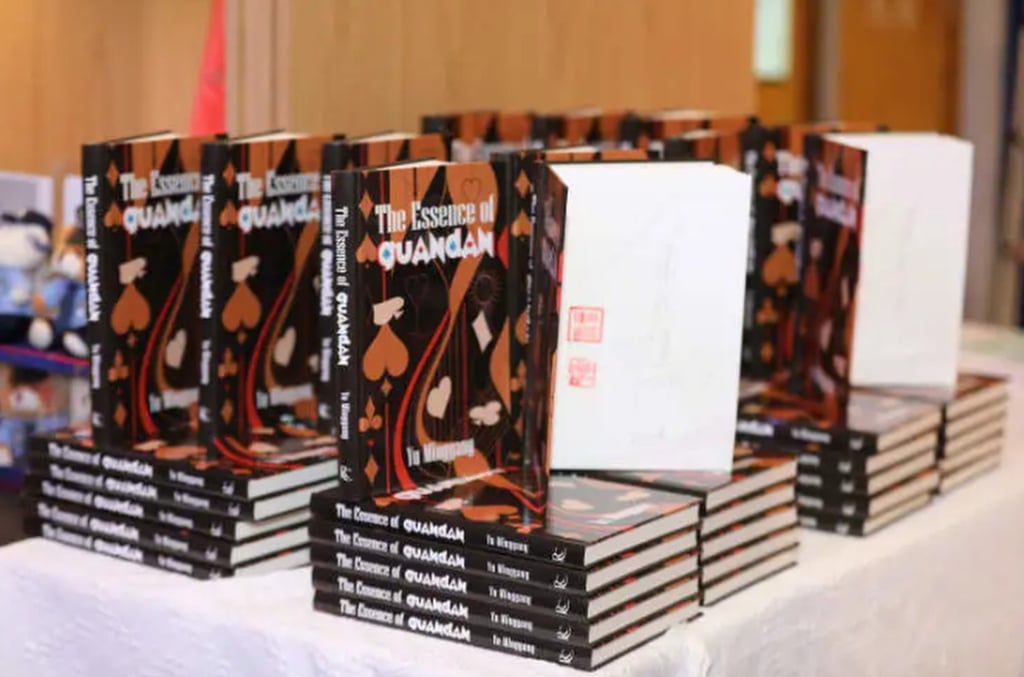 The English version of The Essence of Guandan, above, retails at about US$100. Photo: QQ.com
