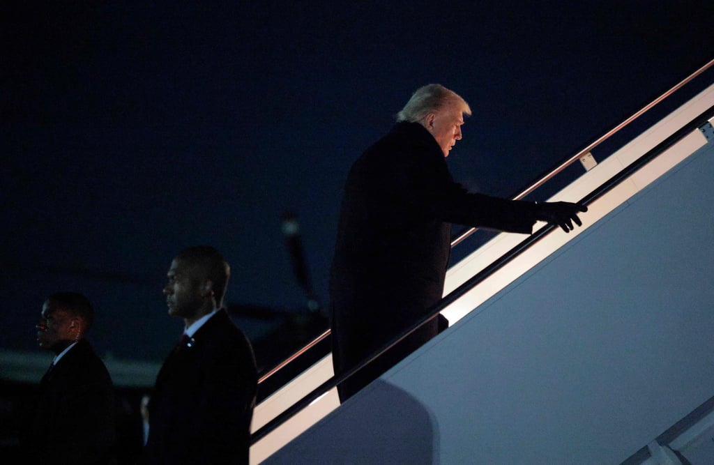 US President Donald Trump boards Air Force One as he leaves for Switzerland. Photo: AFP