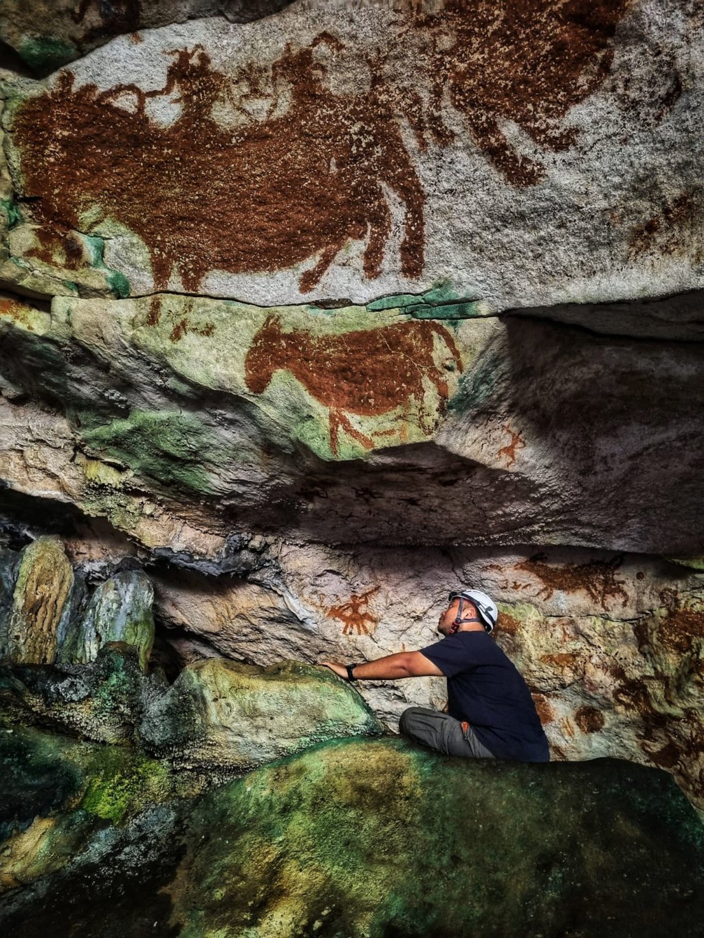 Prehistoric cave paintings in Sulawesi, Indonesia, are seen in an image released on Wednesday. Photo: Maxime Aubert/Griffith University via AFP
