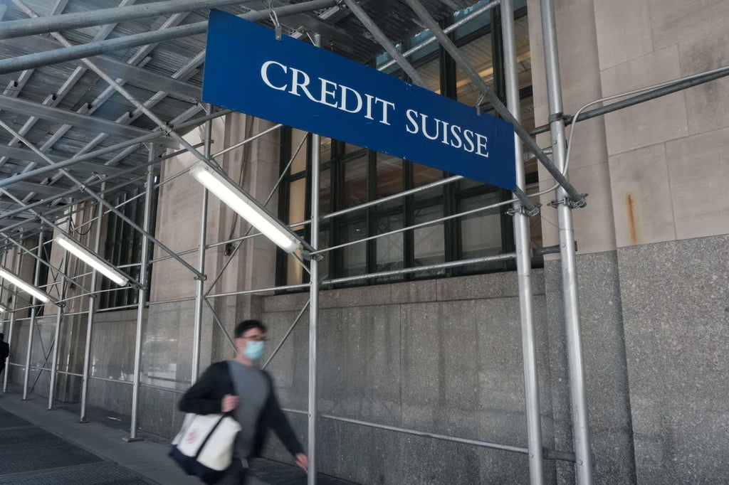 A Credit Suisse sign hangs outside the company’s offices in New York in March 2021. Photo: AFP