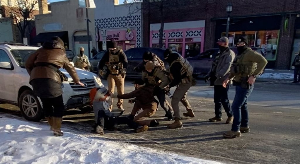 A video screengrab shows a law enforcement officer pinning Alex Pretti before he was fatally shot in Minneapolis on January 24. Photo: Reuters