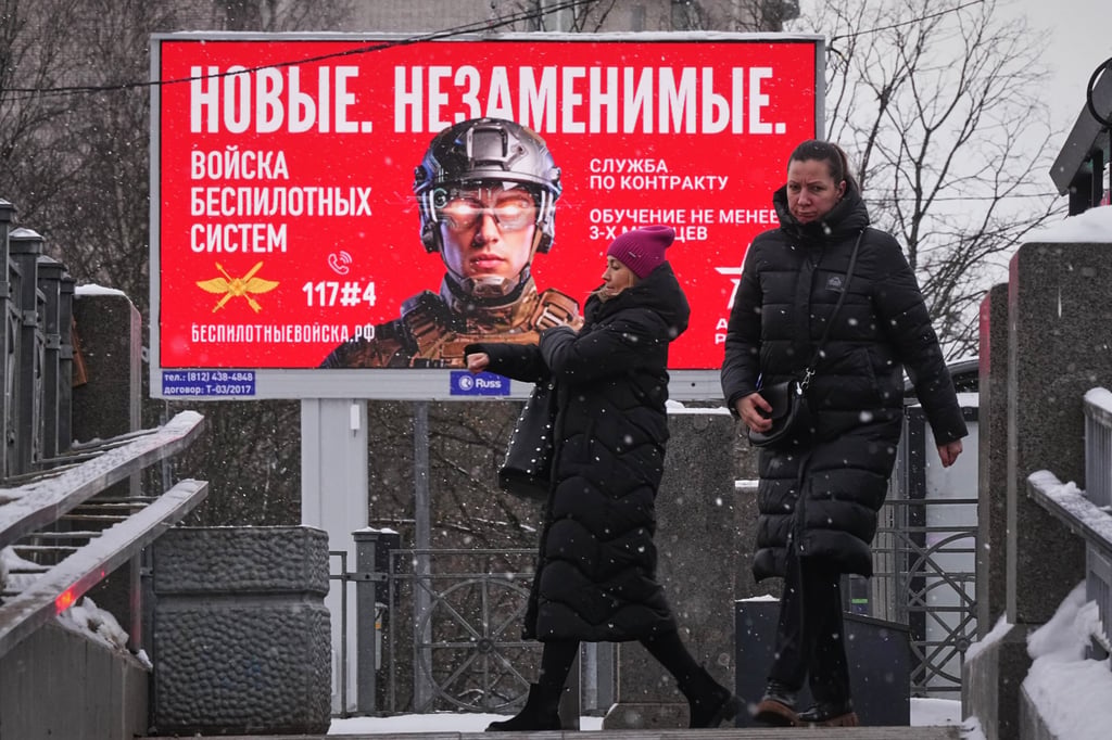 A billboard in St Petersburg advertising contract Russian military service. It reads: ‘New. Irreplaceable. Unmanned Systems Troops’. Photo: EPA