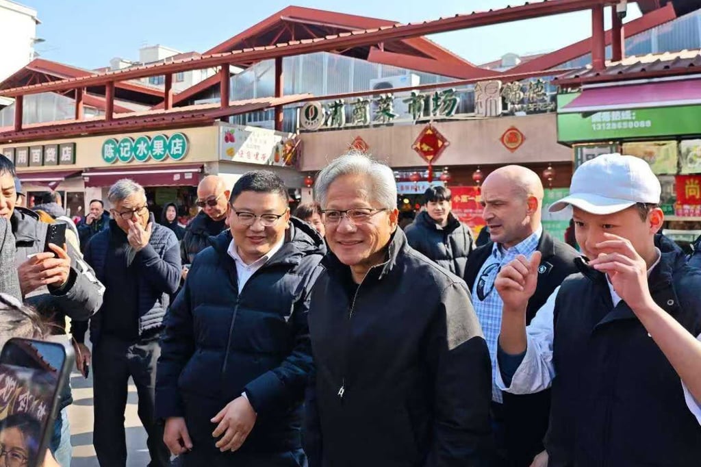 Nvidia CEO Jensen Huang, to the right of the man in a baseball cap, was spotted at a grocery market in Shanghai in January. Photo: RedNote