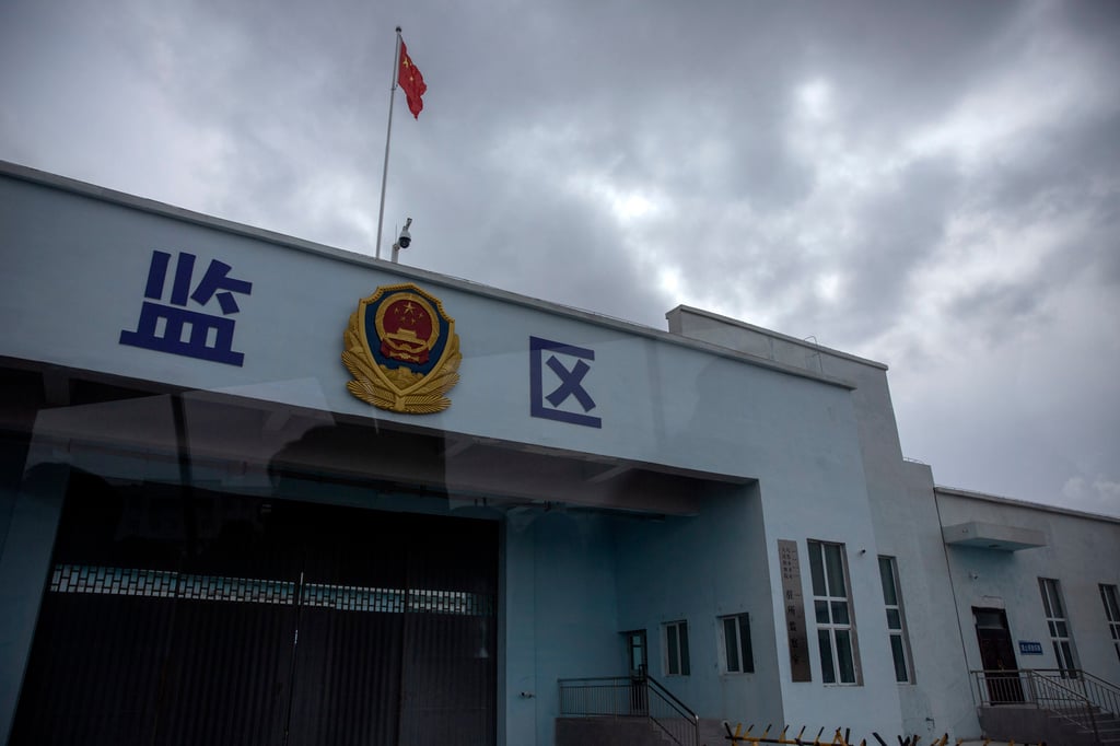A Chinese flag flies over an entrance to the inmate detention area at the Urumqi No 3 Detention Centre in Xinjiang in April 20211. Photo: AP