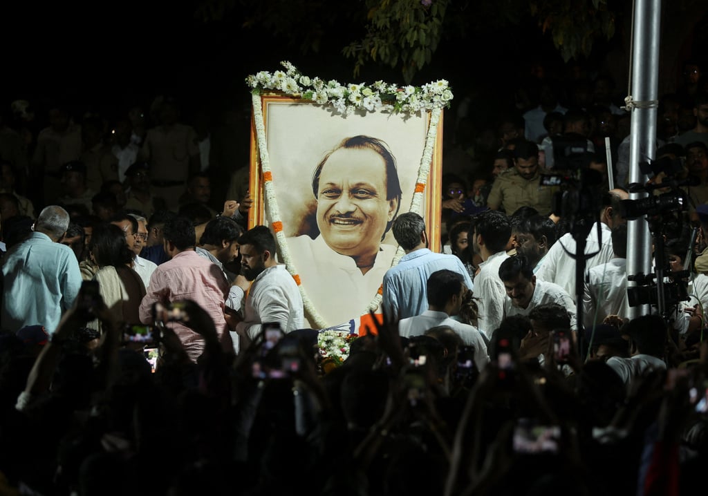 People pay their last respects to Maharashtra Deputy Chief Minister Ajit Pawar after he was killed in a plane crash in Baramati, India, on Wednesday. Photo: Reuters