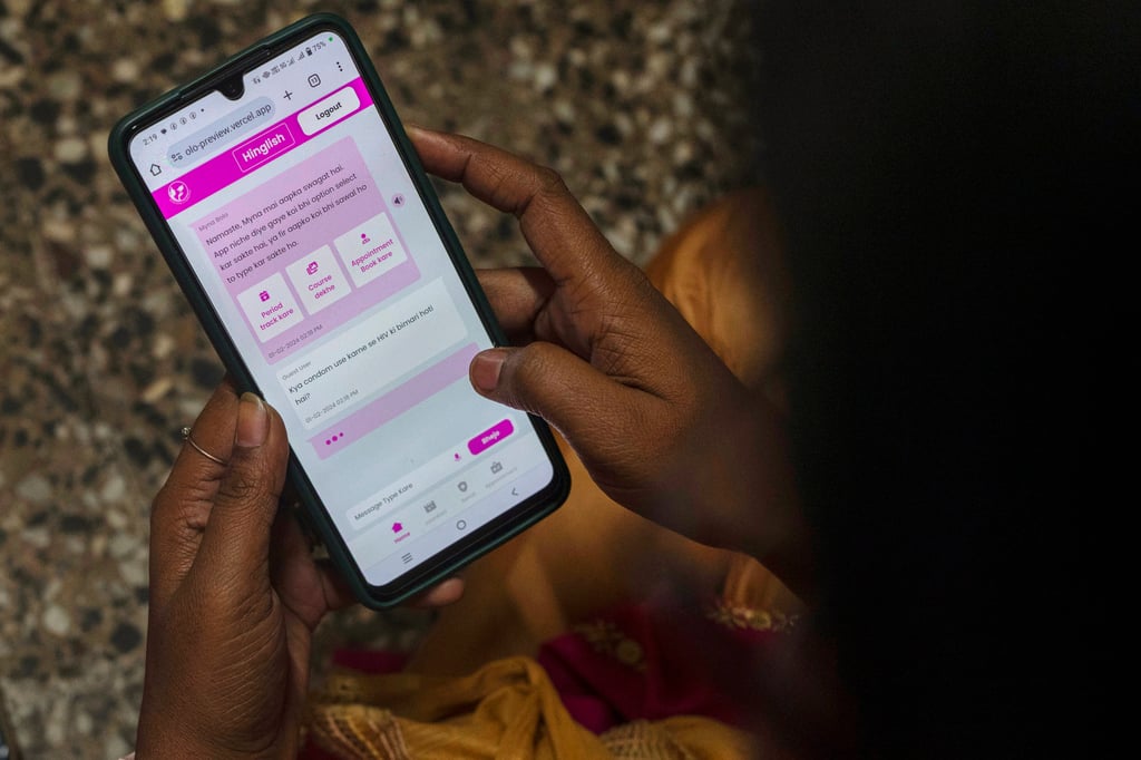 A woman learns to use a chatbot powered by artificial intelligence at a women’s organisation’s office in Mumbai, India, on February 1, 2024. Photo: AP