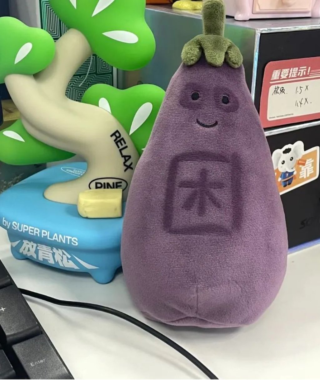 This forlorn looking eggplant stuffed toy is just one of the many types of “children” available on the market. Photo: RedNote