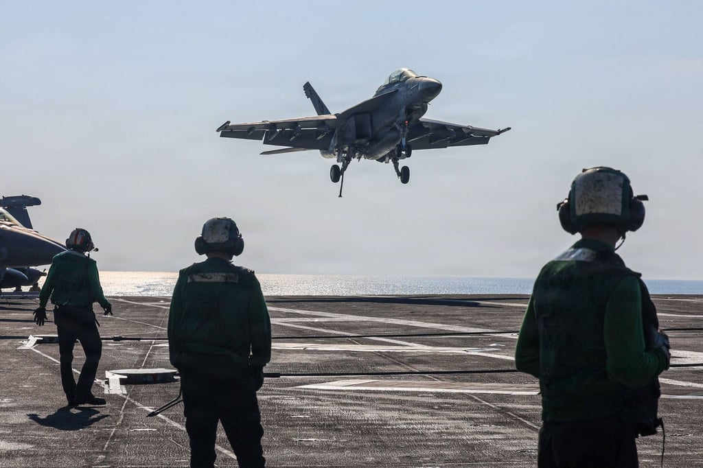 An F/A-18F Super Hornet lands on the flight deck of the USS Abraham Lincoln in the Arabian Sea in January. Photo: US Navy via AFP
