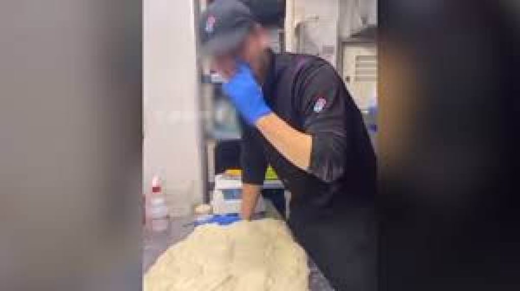 A chef picks his nose and then wipes his finger on some dough in a “baito tero” video. Photo: Handout