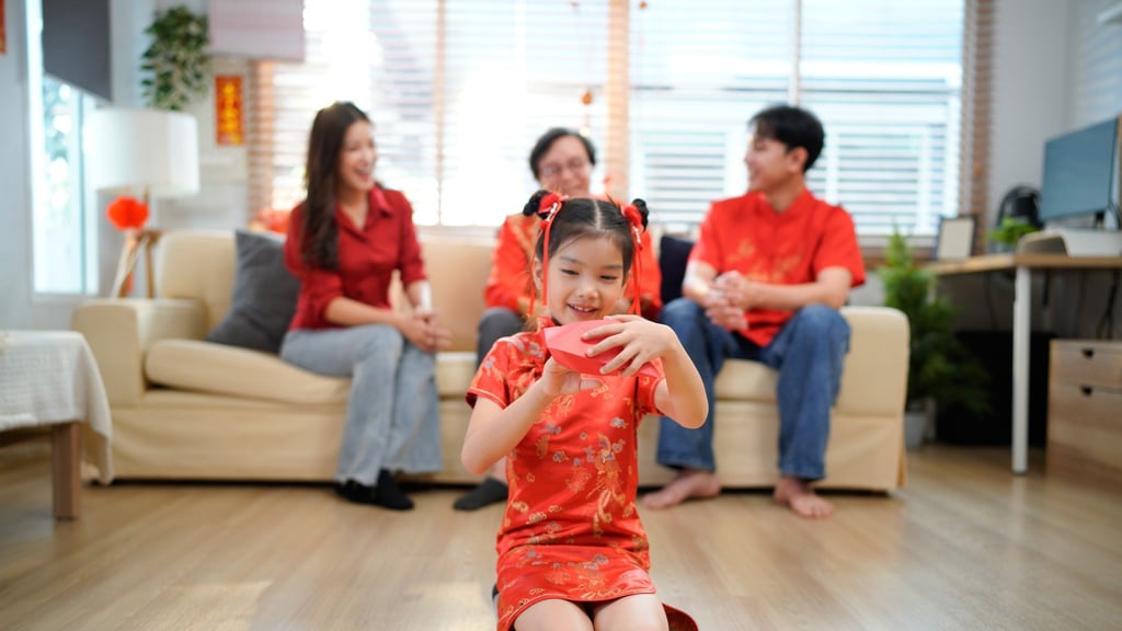 In China, it’s traditional for adults to gift children or unmarried individuals, regardless of age, lucky money wrapped in red envelopes during the Spring Festival, wishing them luck and health for the coming year. Photo: Shutterstock