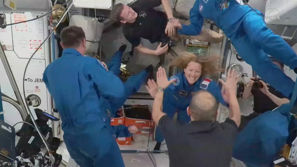 France’s Sophie Adenot, Russia’s Andrei Fedyaev and Americans Jessica Meir and Jack Hathaway greet colleagues as they enter the International Space Station on Saturday. Photo: Nasa via AP