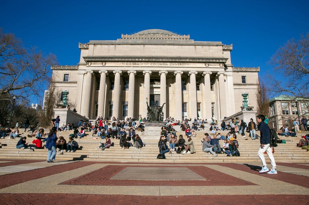 Students sit on the front steps of Low Memorial Library on the Columbia University campus in New York in February 2023. Photo: AP