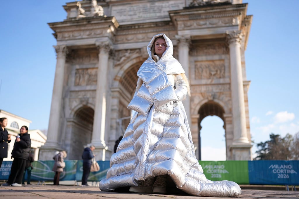Anastasia Kucherova stands near the Arco della Pace in Milan, Italy, on Monday. Photo: AP