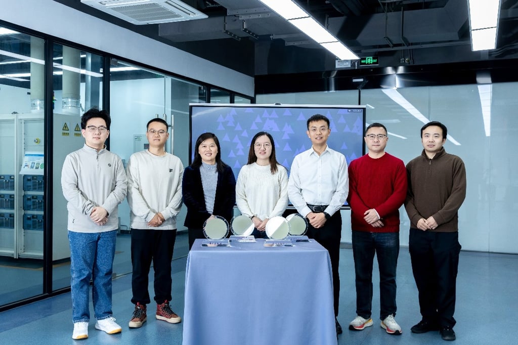 A team led by Wang Jinlan (third left) from Southeast University in Nanjing has announced a breakthrough technique to mass produce 2D material wafers on January 29. Photo: Handout