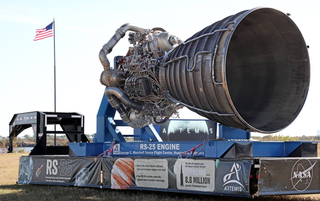One of the massive RS-25 engines for Nasa’s Artemis II Space Launch System rocket is displayed near the countdown clock at Kennedy Space Centre in Cape Canaveral, Florida, on Friday. Photo: AFP