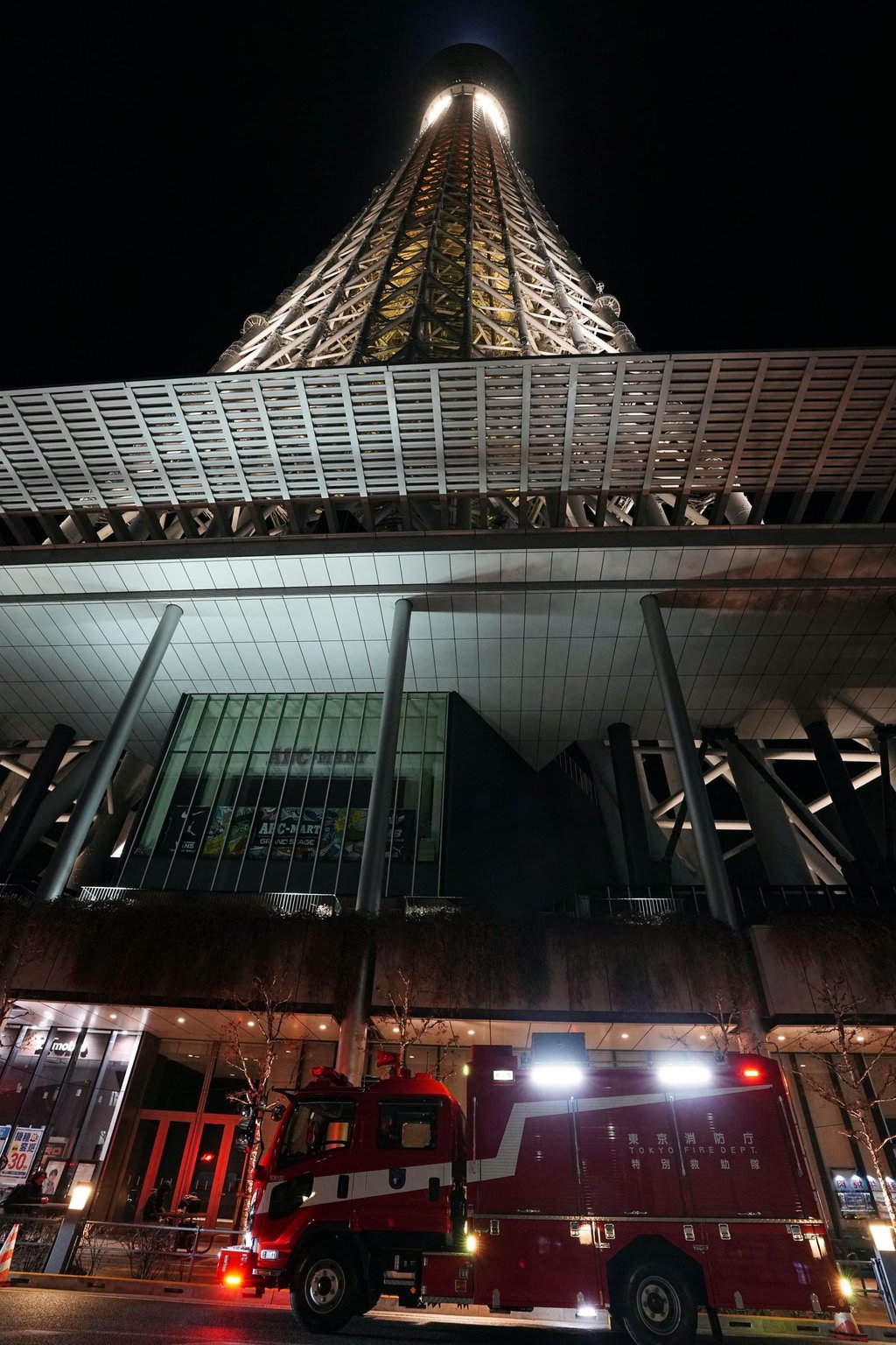 Emergency crews at the scene overnight. Photo: Kyodo
