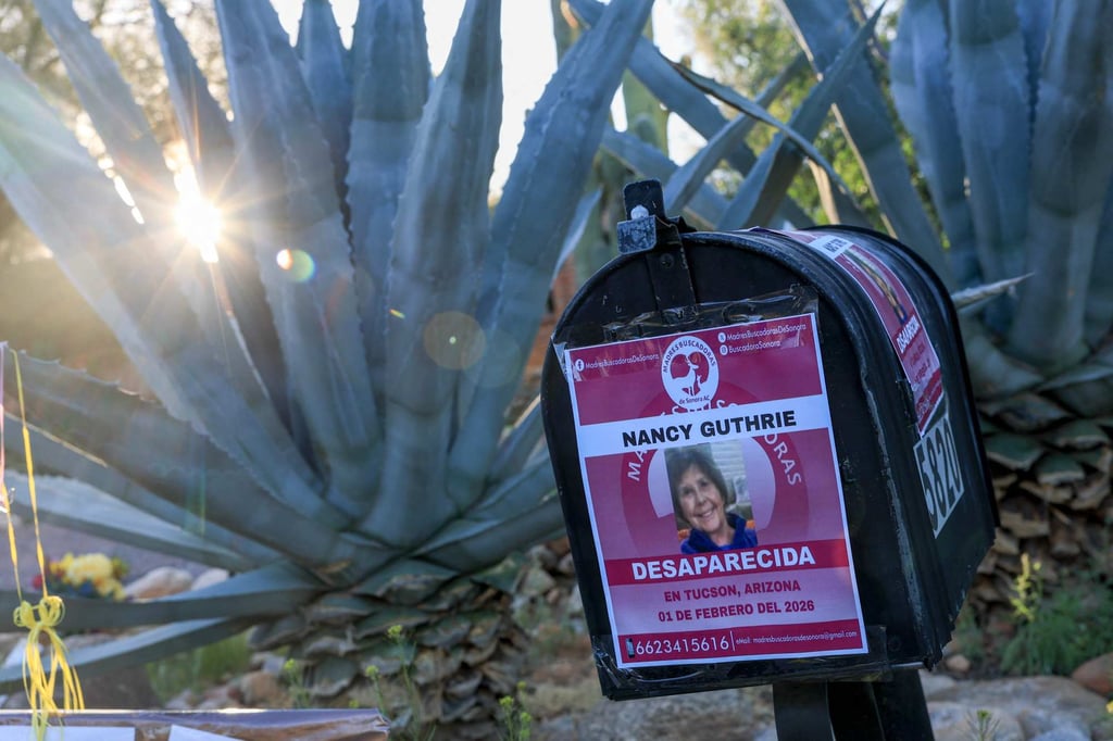 A flier that reads “Nancy Guthrie Desparecida (Disappeared)” is taped to Nancy Guthrie’s postbox in Tucson, Arizona, on Monday. Photo: AFP