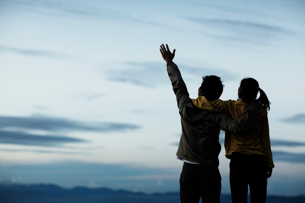 A couple bond on a mountainside. The new naming trend stresses practicality over romance. Photo: Getty Images