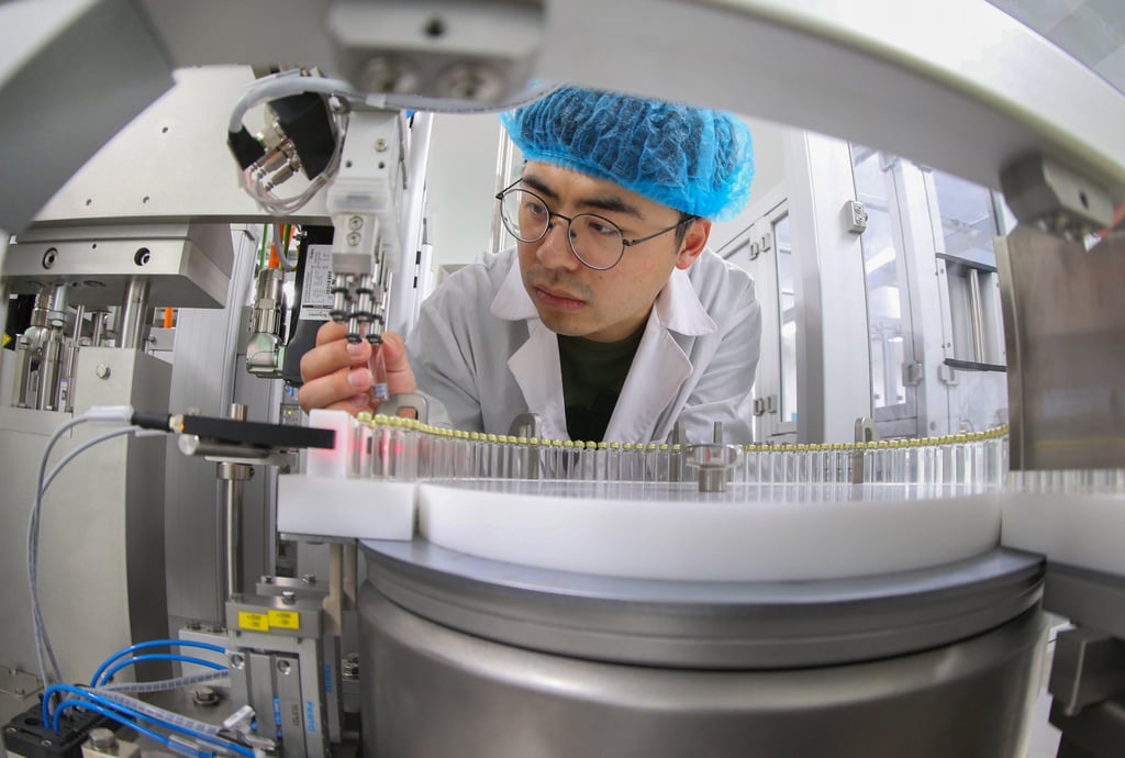 A worker checks a bottle filling fixture at a preparation workshop of Hengrui Biomedical Industrial Park in Lianyungang, Jiangsu province. Photo: Costfoto/Future Publishing via Getty Images