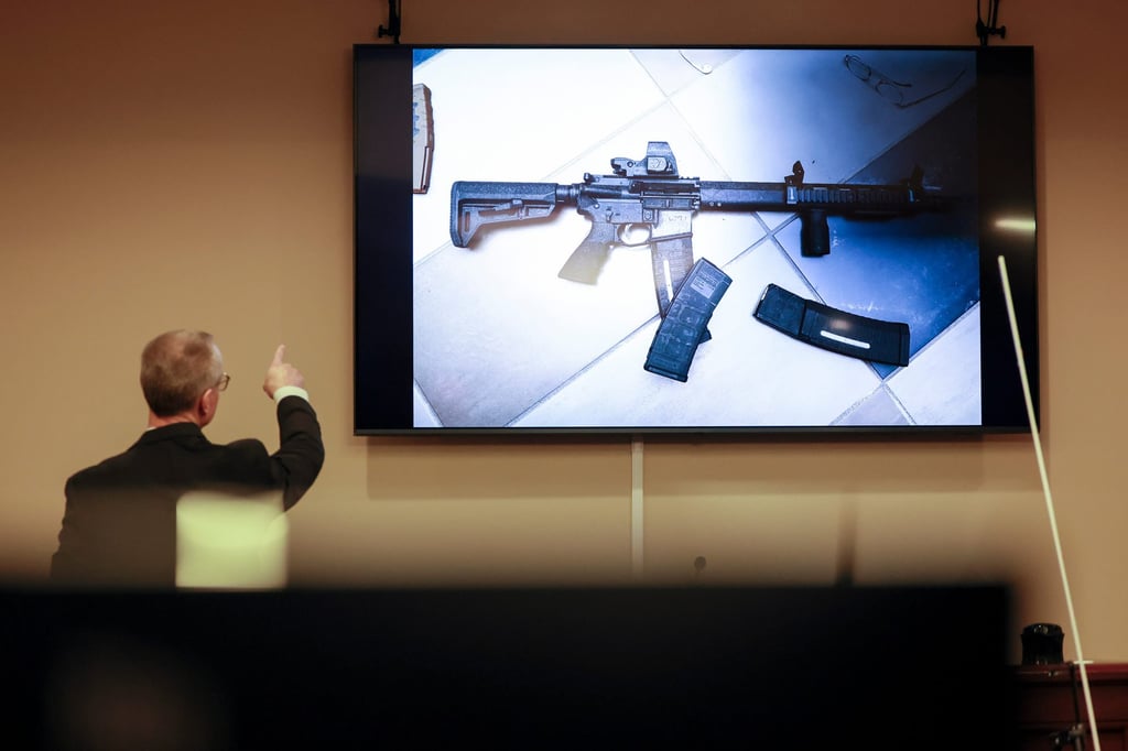 District Attorney Brad Smith points to a weapon displayed on a screen during Colin Gray’s trial in Winder, Georgia, on Monday. Photo: Atlanta Journal-Constitution via AP