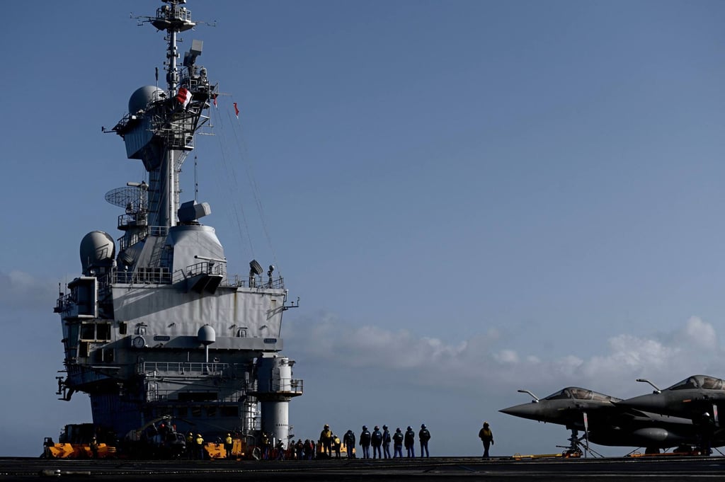 Rafale jet fighters are seen on the deck of the Charles de Gaulle, off the coast of the city of Hyeres, in January 2020. Photo: AFP