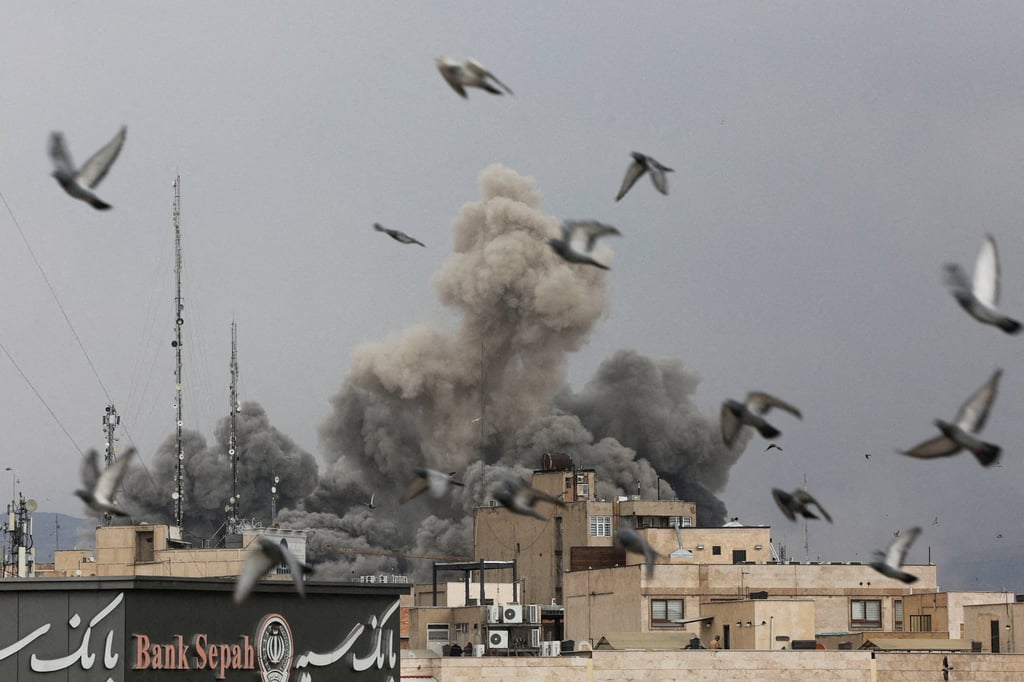 Smoke rises after an explosion during US-Israeli strikes on Iran. Photo: Reuters