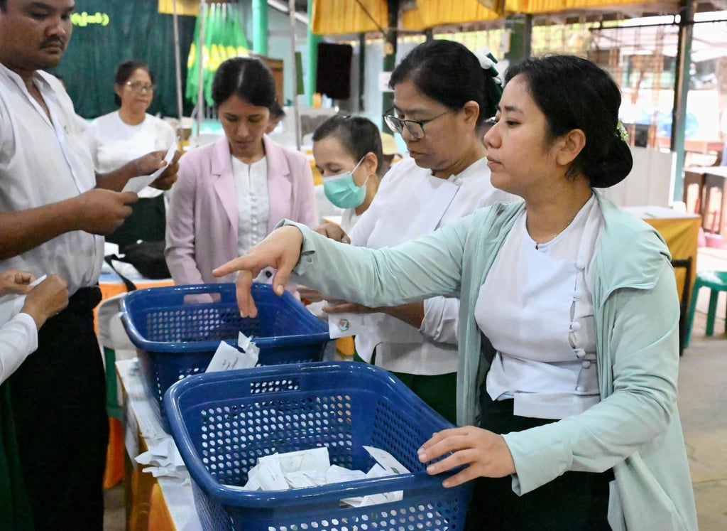 Vote counting takes place in Yangon on January 25 during the general election in Myanmar. Photo: Kyodo