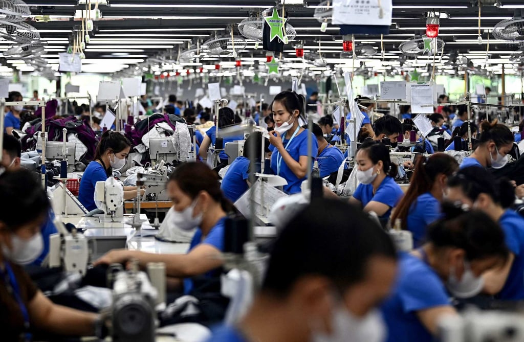 Workers stitch garments at a factory in Vietnam’s Thai Nguyen province. Photo: AFP