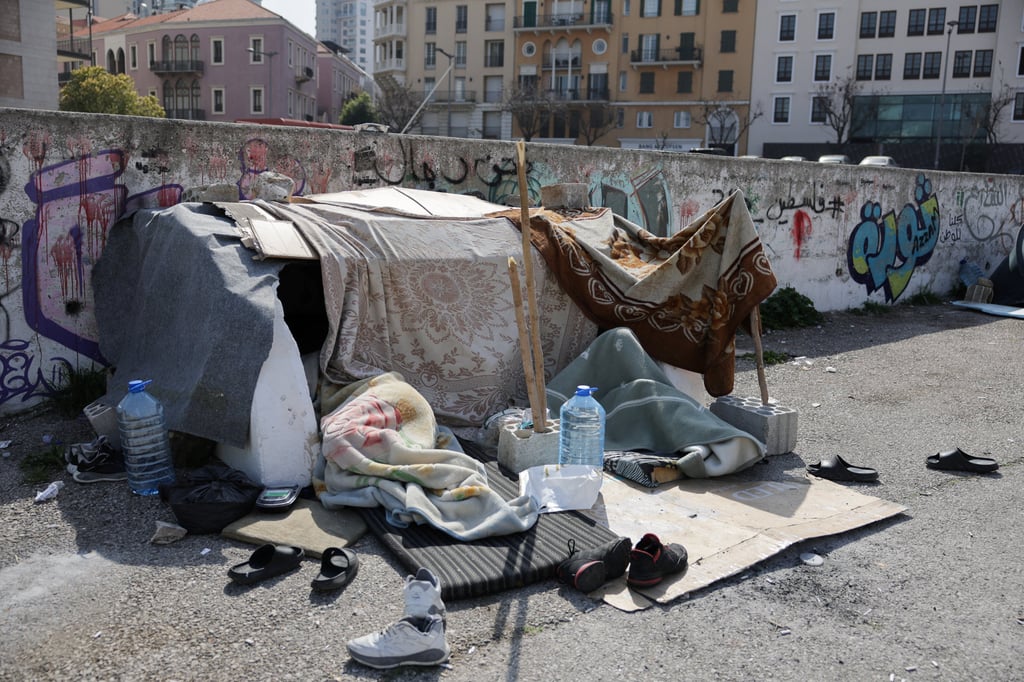 Displaced people rest at a roadside tent, following an escalation between Hezbollah and Israel, in Beirut, Lebanon, on Friday. Photo: Reuters