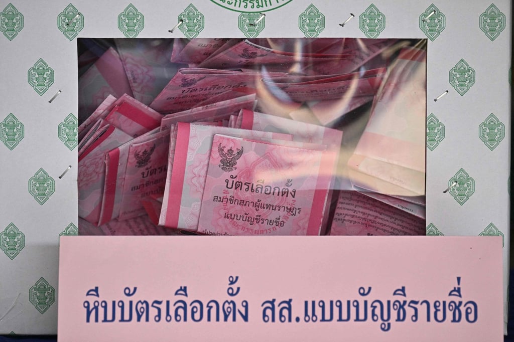 Votes cast in Thailand’s general election are seen in a ballot box in Buriram on February 8. Photo: AFP