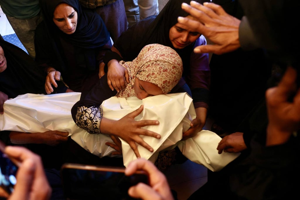 A Palestinian mother in Gaza mourns over the body of her three-year-old son Iyad Ahmed Naeem Al-Rabaiía, who was reportedly killed by an Israeli airstrike in February. Photo: AFP