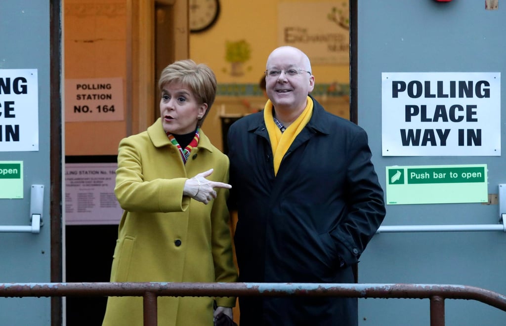 Nicola Sturgeon, then Scottish First Minister, poses for the media with husband Peter Murrell in Glasgow in 2019. Photo: AP