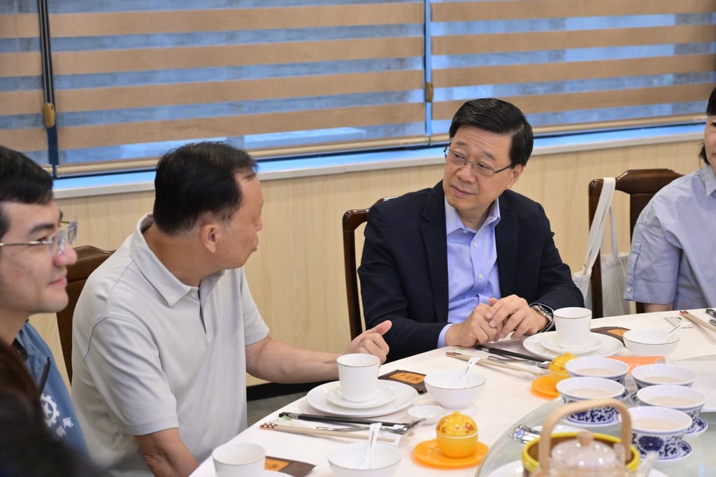 Chief Executive John Lee meets elderly Hongkongers who have retired in Fujian. Photo: Handout
