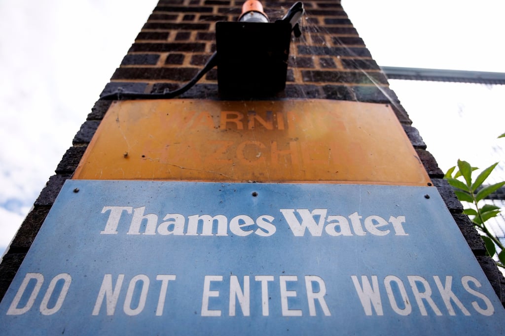 A sign of Thames Water outside the Coppermills Water Treatment Works, which provides about one-third of Greater London’s drinking water, in north London on June 16. Thames Water is a step closer to nationalisation after the British government opposed a proposed private-sector rescue deal. Photo: EPA
