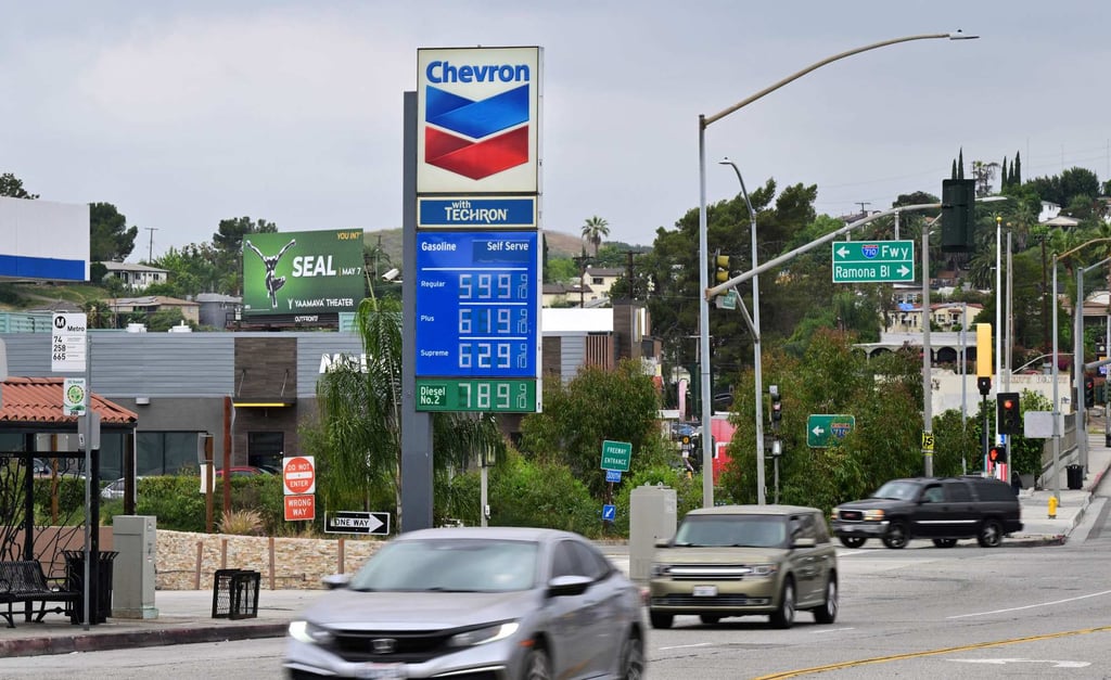 Petrol prices are displayed at a Chevron gas station in Los Angeles, California in March. Photo: AFP
