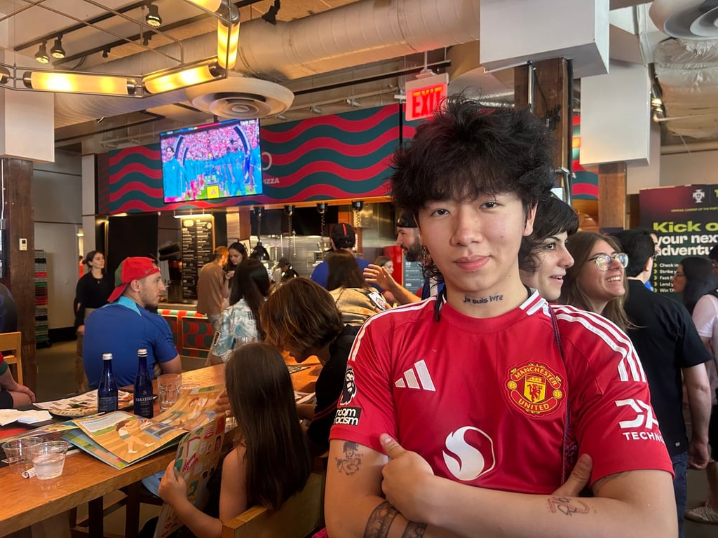Chinese football fan Zhai Yibo before the Portugal v DR Congo Fifa World Cup match at Portugal House in New York. Photo: Lucy Quaggin