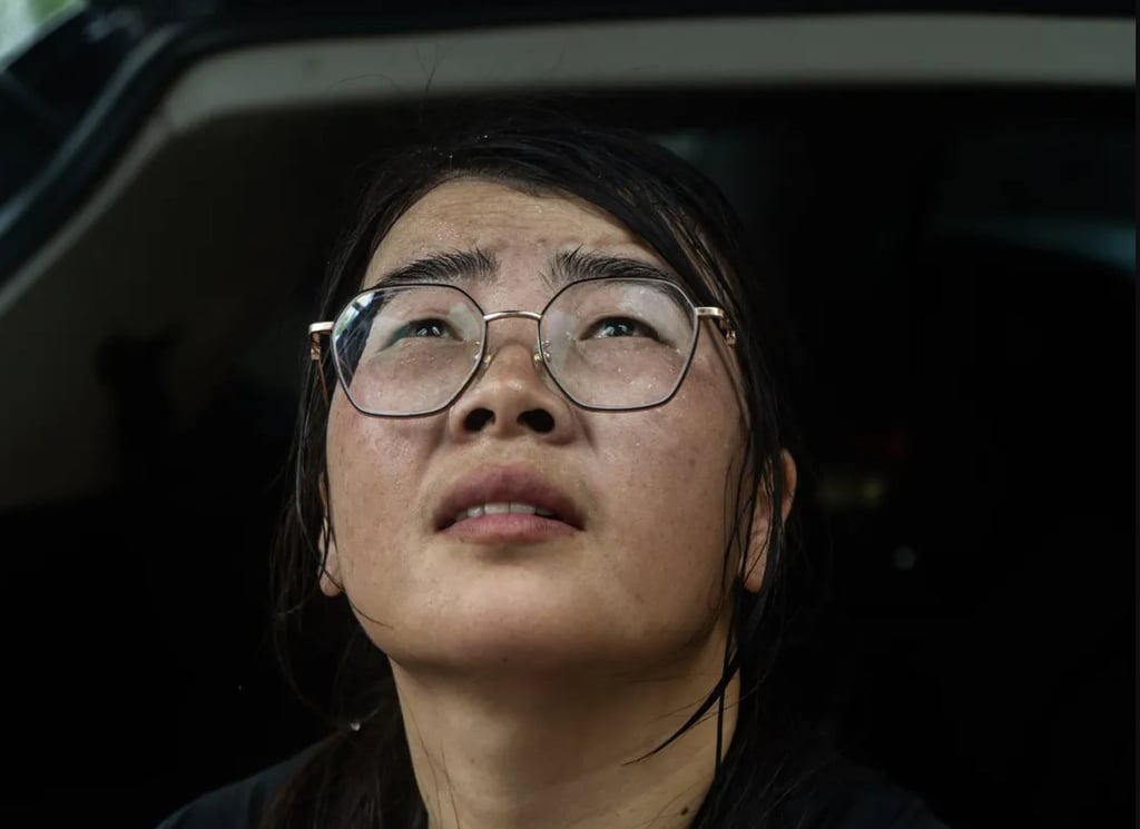 Known online as “Spider-Woman,” Xu Junyun, above, engages in a highly dangerous profession that offers flexible hours and better pay. Photo: QQ.com