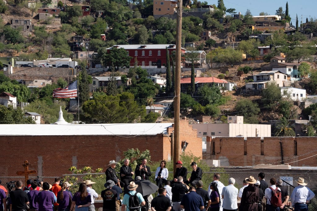 Catholic Bishops speak in front of the US-Mexico border during Border Mass 250 at Sacred Heart of Jesus Catholic Church in Nogales, Arizona, on Saturday. Photo: Reuters
