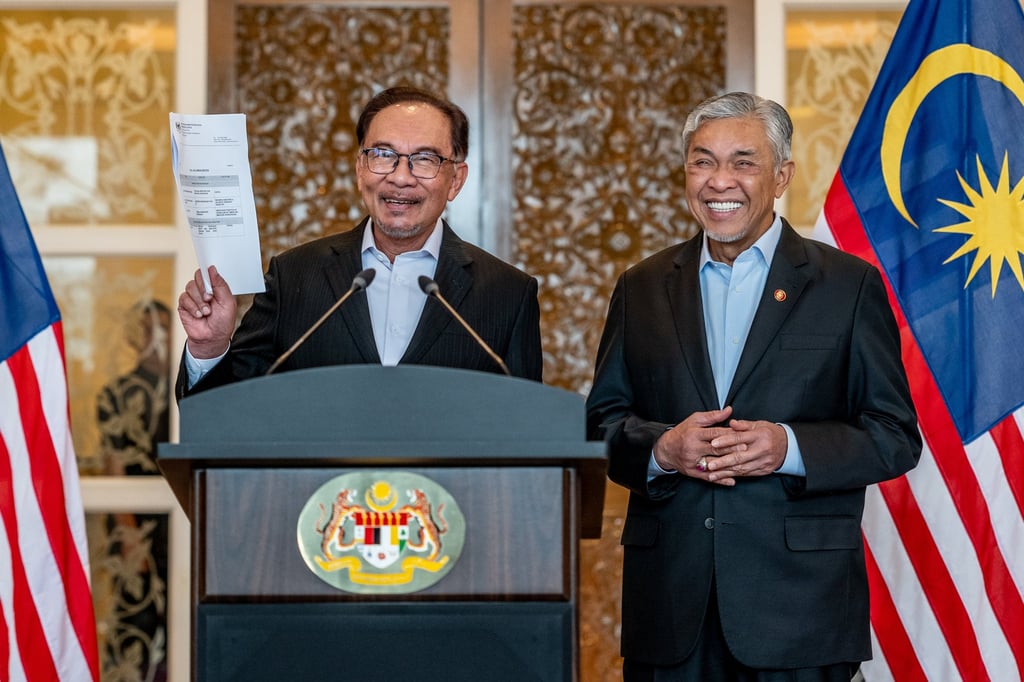 Malaysian Prime Minister Anwar Ibrahim, also chairman of Pakatan Harapan, with Deputy Prime Minister Ahmad Zahid Hamidi, president of Umno. Photo: Prime Minister’s Office of Malaysia / Handout