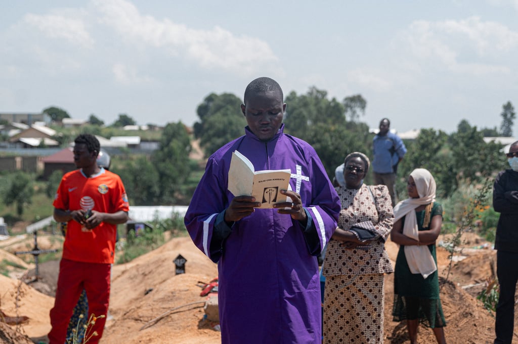 A priest conducts a blessing ceremony on June 19 for a fourth DRC child who died from Ebola at an orphanage in Bunia, Ituri Province. Children account for over 25 per cent of deaths, according to the UN. Photo: via TNS