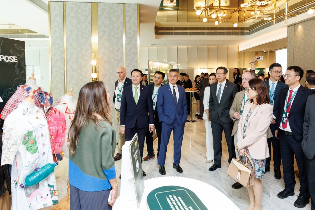 Andy Cheung and guests admire the Chinachem booth, where Gingko House and Pine Care show ways in which seniors can stay creative, confident and actively engaged – from handmade crafts to the fashion runway.