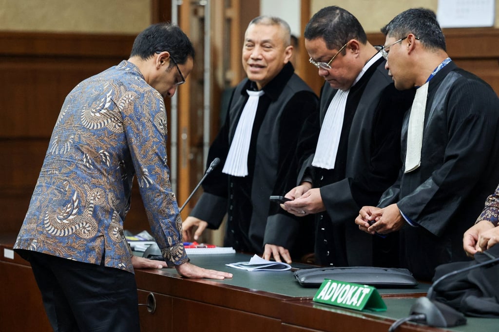 Nadiem Makarim, Indonesia’s ex-education minister and co-founder of ride-hailing firm Gojek, speaks to his lawyers after his verdict in a corruption case related to the procurement of Google Chromebook laptops, on Tuesday. Photo: Reuters