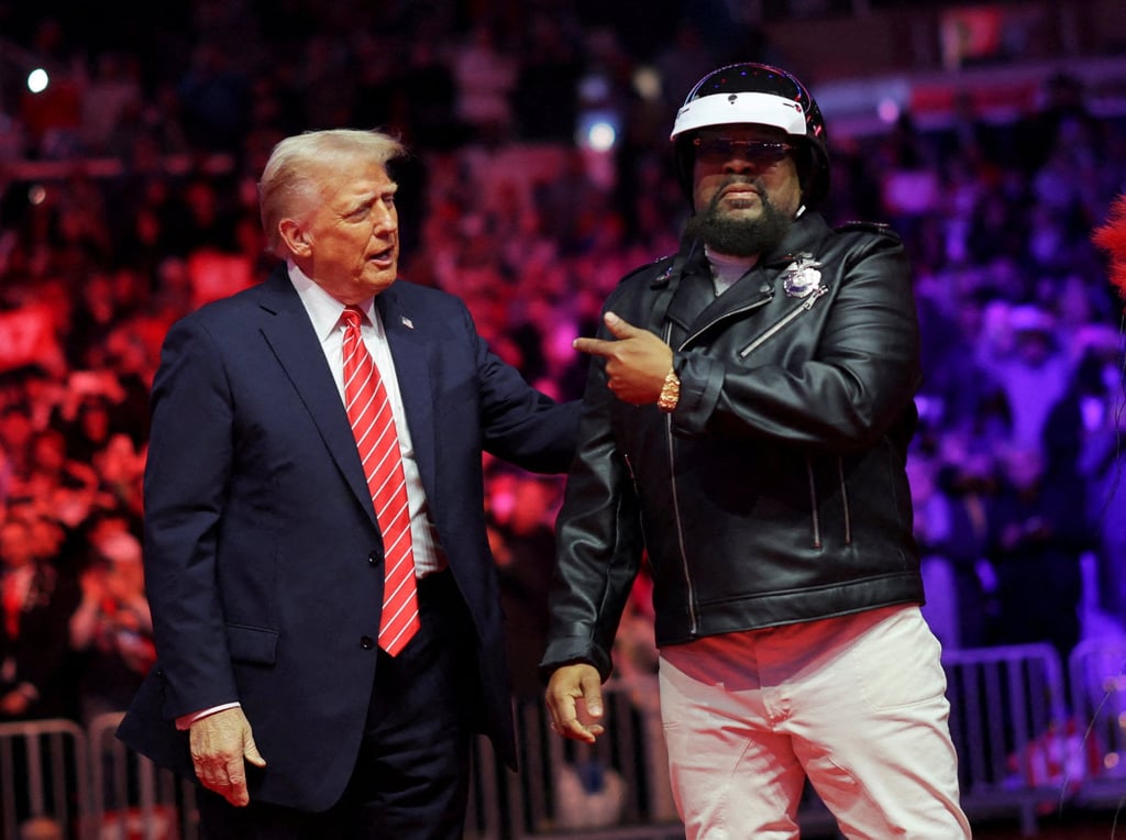 Donald Trump with Victor Willis of the Village People during a 2025 rally, the day before Trump was inaugurated as president for the second time. Photo: Reuters