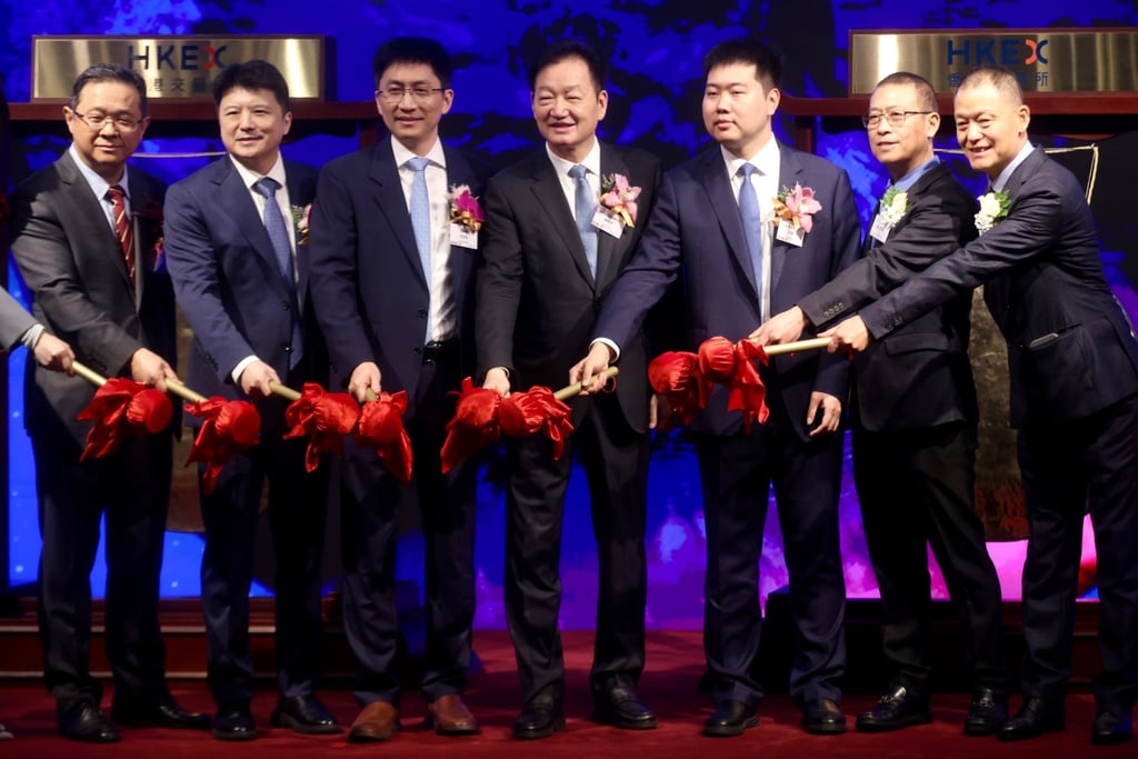 Executives from Muyuan Foods celebrate its listing on February 6. Photo: Jonathan Wong