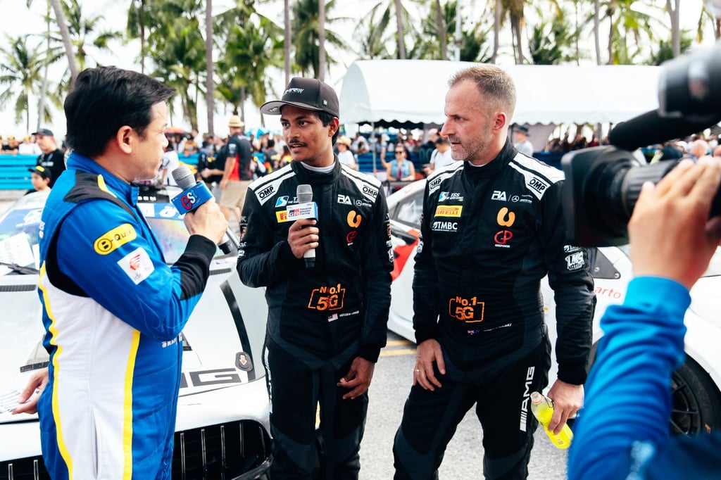 Hayden Haikal (centre) during a post race interview in Australia. Photo: Handout