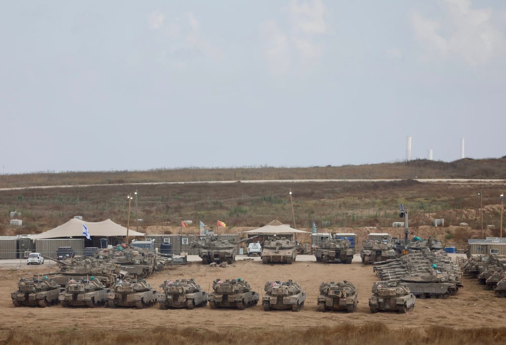 Israeli military vehicles are seen near Kibbutz Reim bordering Gaza in southern Israel, on Thursday.. Photo: Xinhua